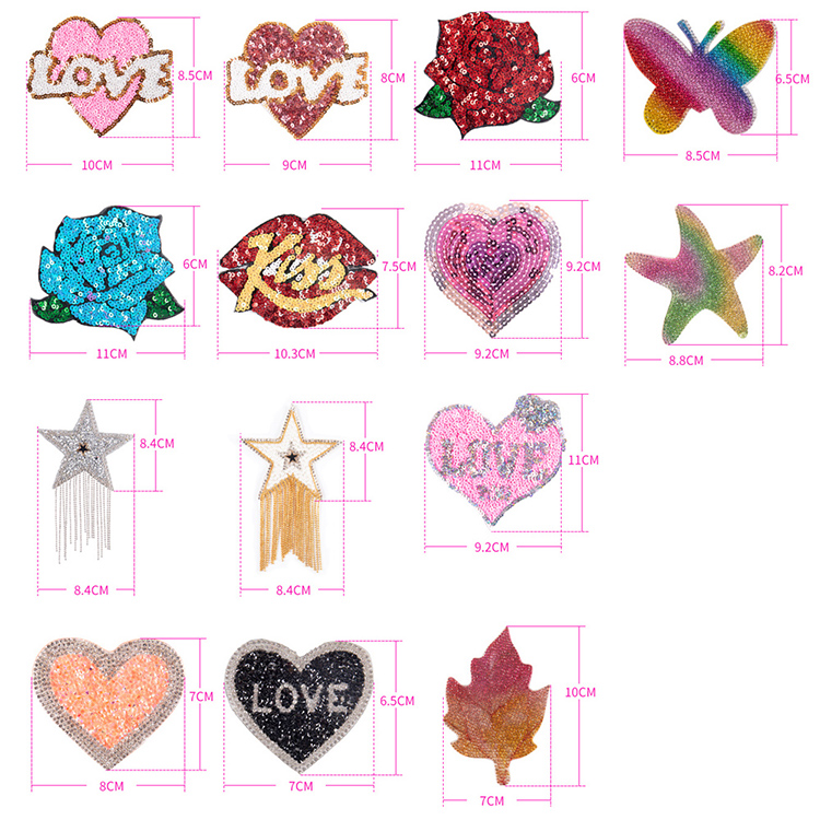 Twelve ornamented pasties measured in centimetres, including LOVE hearts, lips, a rose, a star with tassel, a butterfly and a leaf