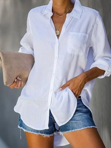 a lady wearing a white shirt