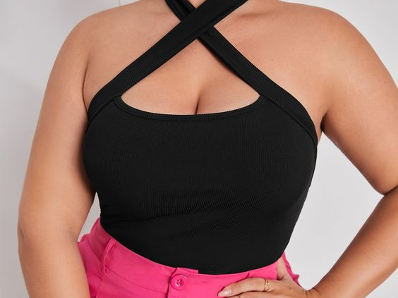 a lady wearing a halter neck top
